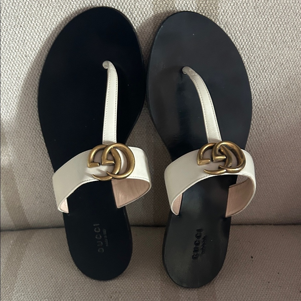 Gucci Women's Black and White Sandals with Gold Accent